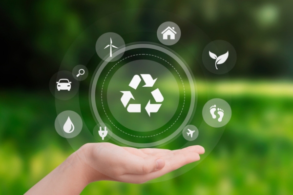 hand with different icons depicting environmental benefits