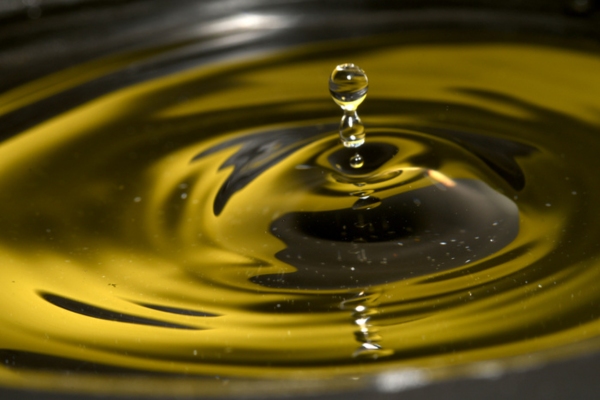 gold liquid drop depicting heating oil