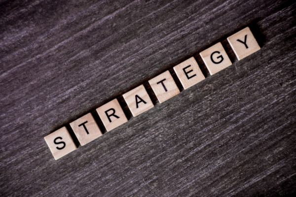 strategy spelled using wooden letter chips depicting prevention of heating oil freezing