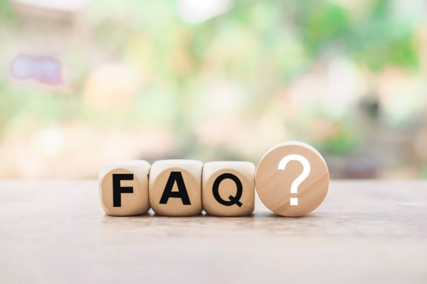 FAQ and question marked spelled using wooden blocks depicting questions about furnace